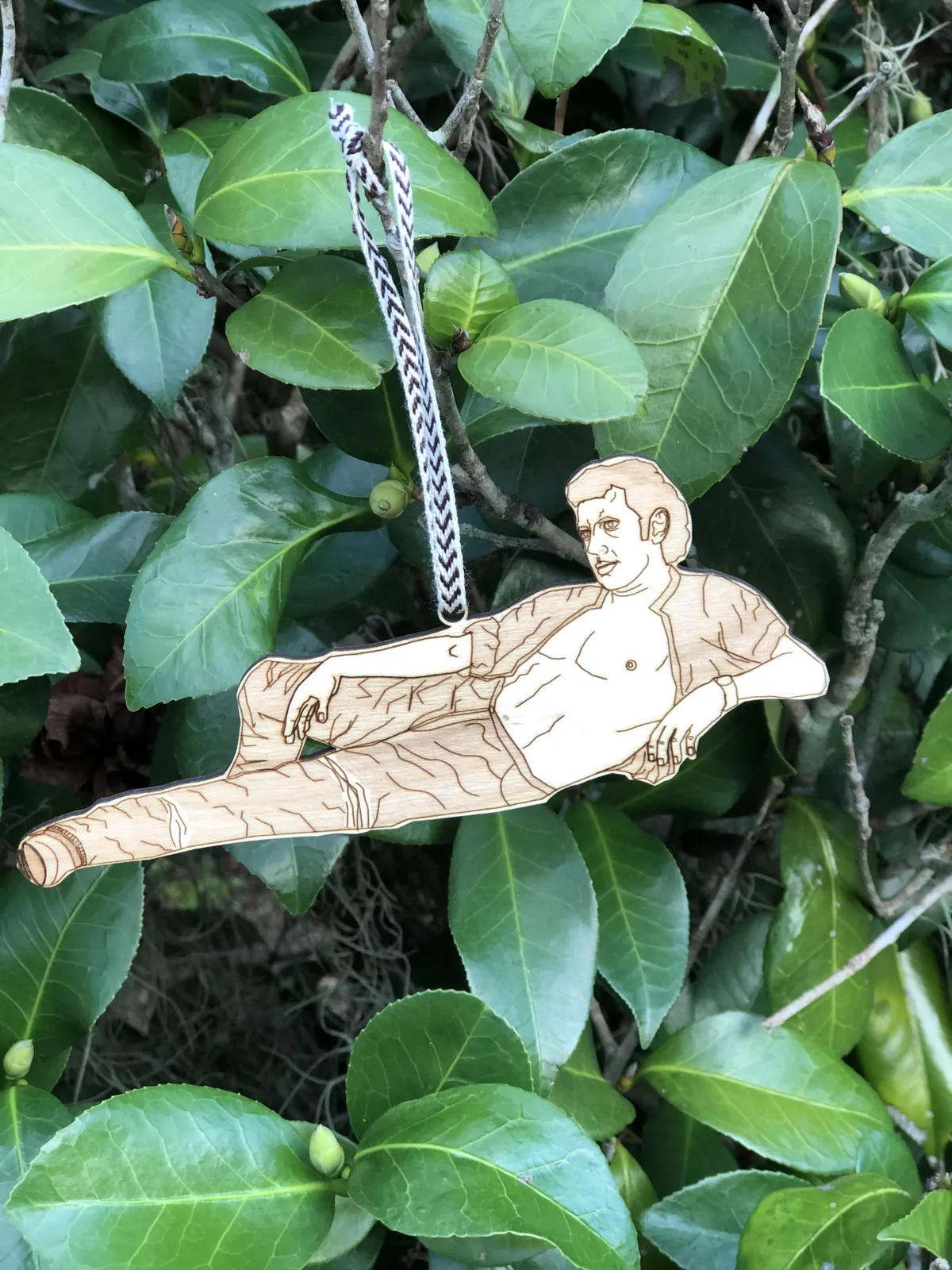 Goldcoin Creations 製作的雷射雕刻木質人物吊飾